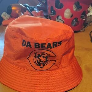 Vibrant orange unisex bucket hat featuring the Chicago Bears logo and 'DA BEARS'